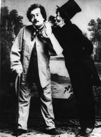 Josip Nolli - Nolli in Kajzelj Peregrin v neznani komediji v času od 1867 - 1890.
Fotografija je last: SLOGI (SGM).
Neg.: S.XXXI,8. Sig. 97